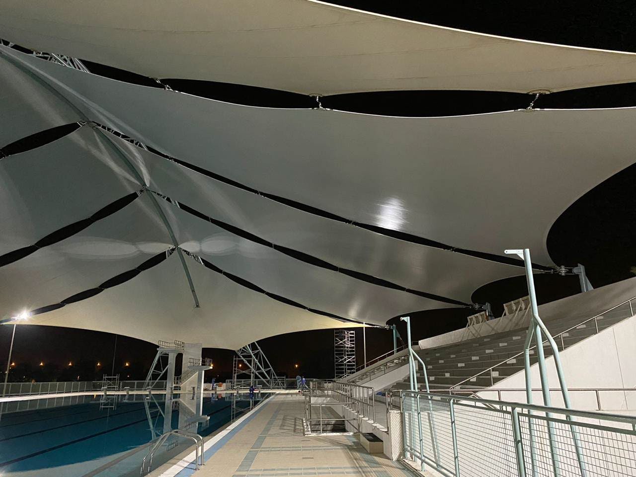 Long-span tensile shade over the swimming pool at Dubai Men’s College