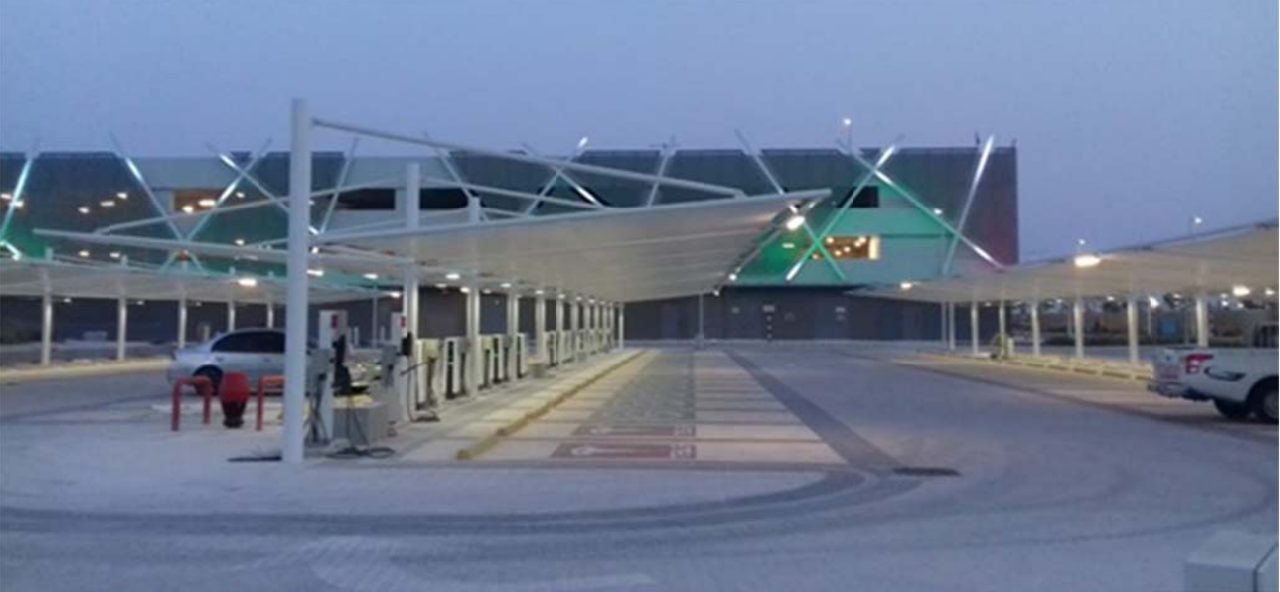 Car park tensile shade structures at Warner Bros. World Abu Dhabi at dusk